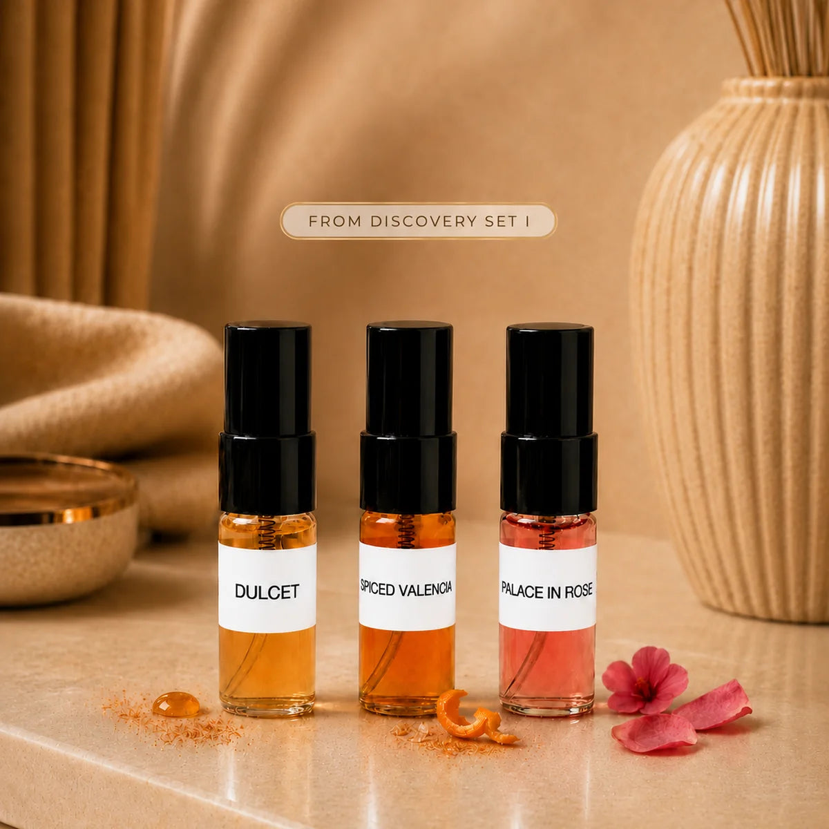 SOVRAI Discovery Set I with three 2 mL extrait de parfum sample vials in a warm luxury studio setting.